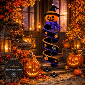 May include: A hanging crochet Halloween decoration featuring a jack-o'-lantern head with a black witch hat and purple scarf, attached to a black spiral ribbon adorned with orange stars, white spiderwebs, and small jack-o'-lanterns with bat charms.