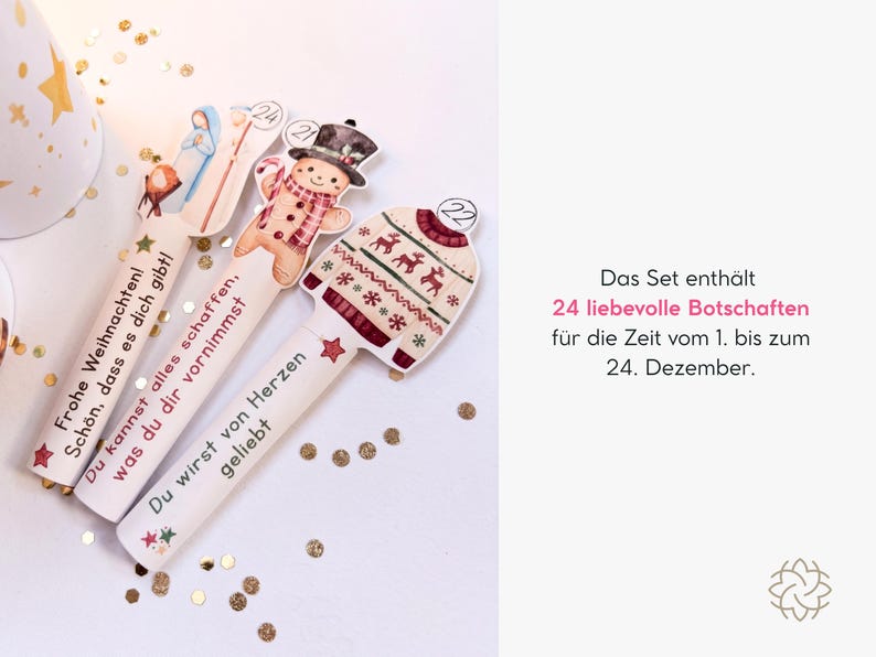 May include: Three die-cut paper strips featuring Christmas illustrations of a nativity scene, a gingerbread person, and a patterned sweater, each labeled with numbers 24, 21, and 22, and printed with German text messages for the holiday season.