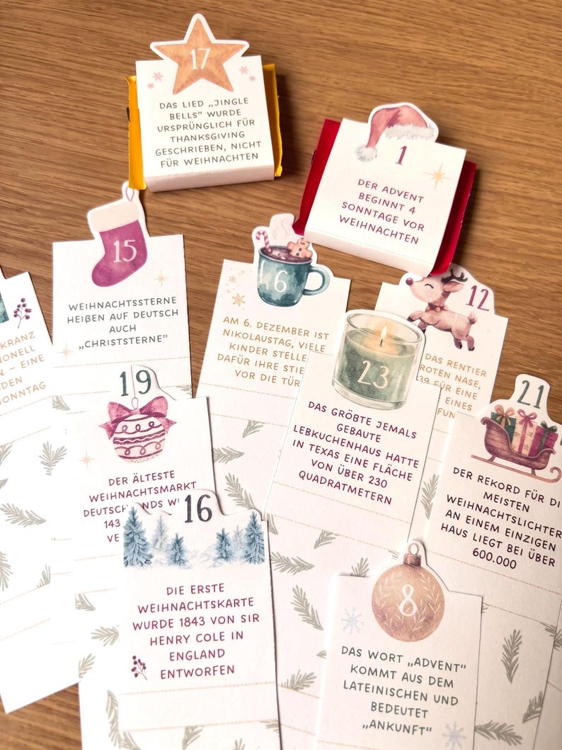 May include: A collection of rectangular advent calendar cards featuring numbered tabs from 1 to 23, each decorated with festive illustrations like a star, Santa hat, stocking, mug, reindeer, candle, ornament, and sleigh, containing German text.