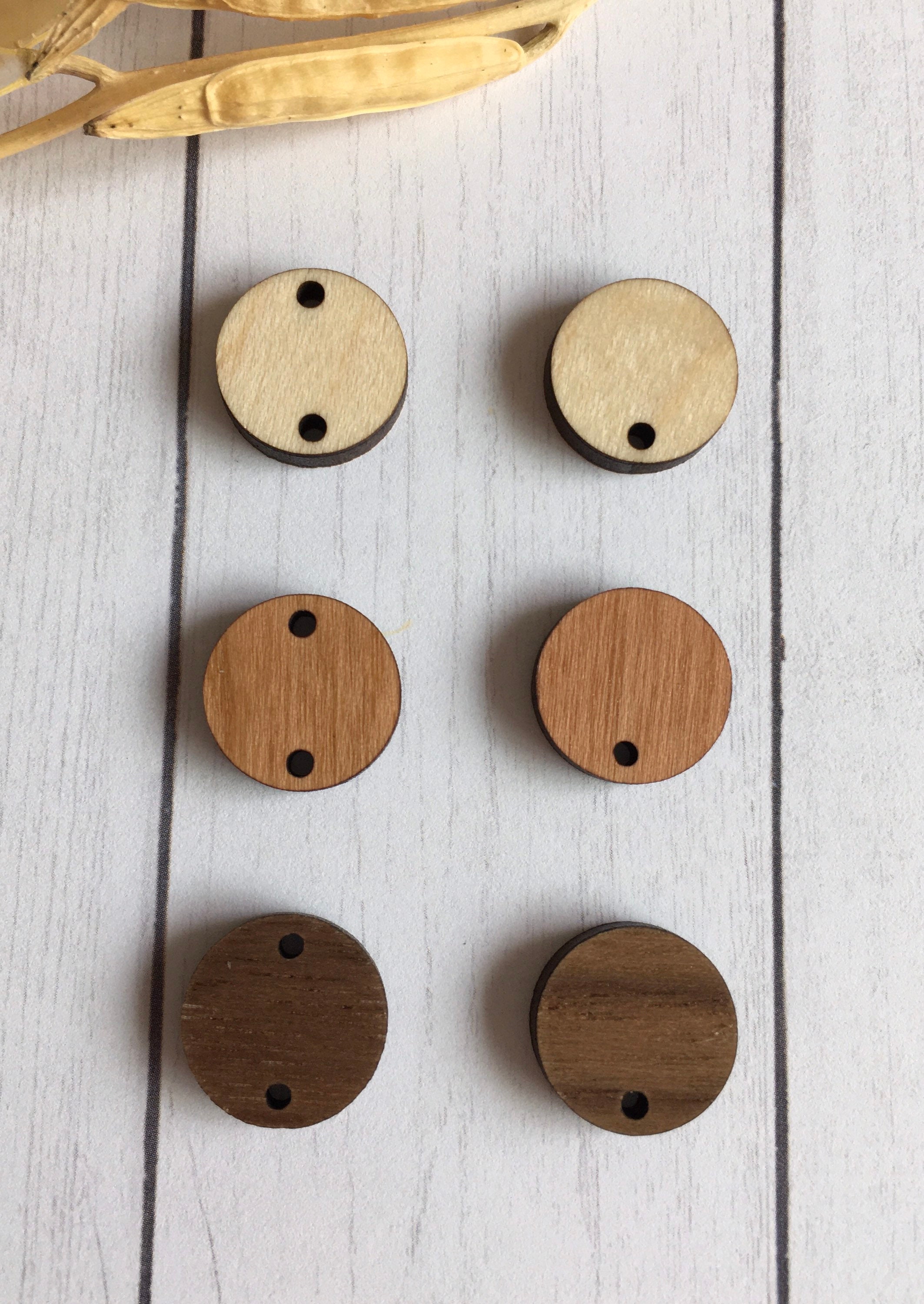 0.675 inch circle stud / connector  - finished wood - one or two hole…