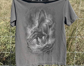 Retro Savage Spinosaurus Graphic Tee, Prehistoric Swamp Predator Shirt, Dark Jurassic Adventure Style Top, Comfort Colors® Dino Gift Tee