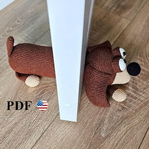 Schema all'uncinetto amigurumi: cane fermaporta
