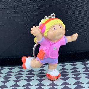 Vintage 1984 Cabbage Patch Kid Rollerskating Figure Keychain - Carry Some 80s Childhood Nostalgia in Your Pocket!