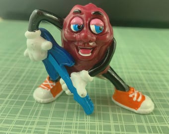 Vintage 1980’s California Raisins Electric Guitar Player Keychain
