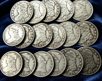 Set di 17 monete da mezzo dollaro con busto coronato (1807-1839), raro oggetto da collezione statunitense.