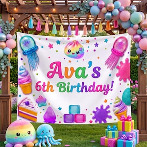 May include: A white birthday banner featuring the text Ava's 6th Birthday in colorful letters, surrounded by illustrations of jellyfish, ice cream, cake, and stars. The banner is hung on a wooden pergola decorated with a pastel balloon arch.