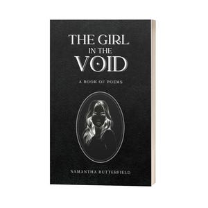 May include: A hardcover book titled "THE GIRL IN THE VOID: A BOOK OF POEMS" by Samantha Butterfield. The cover is black with white text and a portrait of a woman in an oval frame. The book has a white spine.