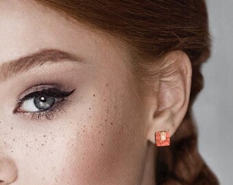 Mini asymmetrical stud earrings in marine leather
