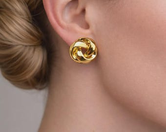 Boucle d'oreille torsadée en acier