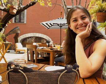 Minimalist.                                                          Piece that highlights the beauty of slow fashion and handcrafted detail