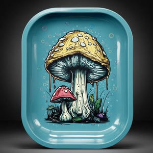 May include: A light blue rectangular tray with rounded corners. The tray features a colorful illustration of two mushrooms, one large with a yellow cap and white spots, and a smaller red mushroom. Bubbles and green foliage surround the mushrooms.