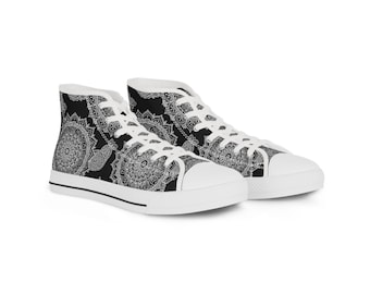 May include: Pair of high-top sneakers with a black background and a white mandala pattern. The sneakers have white laces, a white toe cap, and a white sole. The shoes are designed for casual wear.