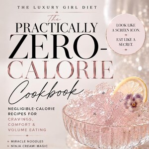 May include: A cookbook cover with the title "The Practically Zero Calorie Cookbook." The cover features a glass bowl filled with a pink, sparkly dessert garnished with a lemon slice and a flower. The text includes "Negligible-Calorie Recipes for Cravings, Comfort & Volume Eating."