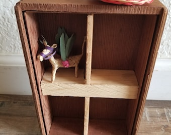 Small wooden curio shelf