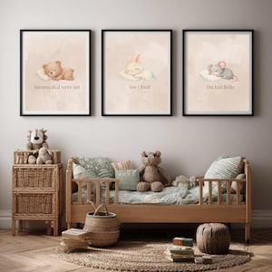 May include: Three framed wall art prints featuring watercolor illustrations of a sleeping bear, a sleeping rabbit, and a sleeping mouse on a beige background. The prints include the text Sovnen skal være søt, Sov i fred, and Du kan hvile.