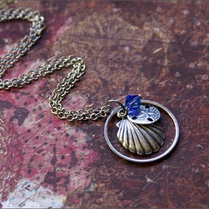 Beach Necklace w/ Seashell, Sand Dollar and Blue Swarovski Crystal Circle in the Sand by RevelleRoseJewelry
