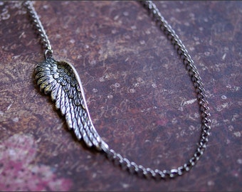 Sideways Wing Necklace -GORGEOUS ANGEL WING Jewelry- Silver Pendant Necklace. Stylish Celebrity Style Sideways Necklace.