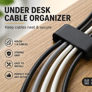 May include: A black under-desk cable organiser holding multiple cables of different colours. The text on the image reads "UNDER DESK CABLE ORGANIZER" and "Keep cables neat & secure." Additional text indicates it holds 1-8 cables and is easy to install.