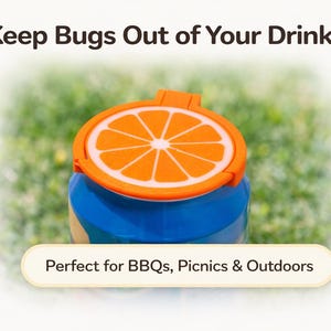 May include: A blue and orange drinks container with a lid resembling an orange slice. The text reads "Keep Bugs Out of Your Drink". The container is designed for outdoor use, ideal for picnics and BBQs.