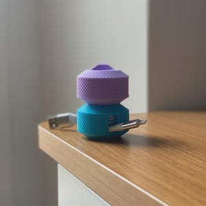 2-pack | Minimalistisk roterande kabelorganisatör | Kompakt sladdvinda | Stapelbar