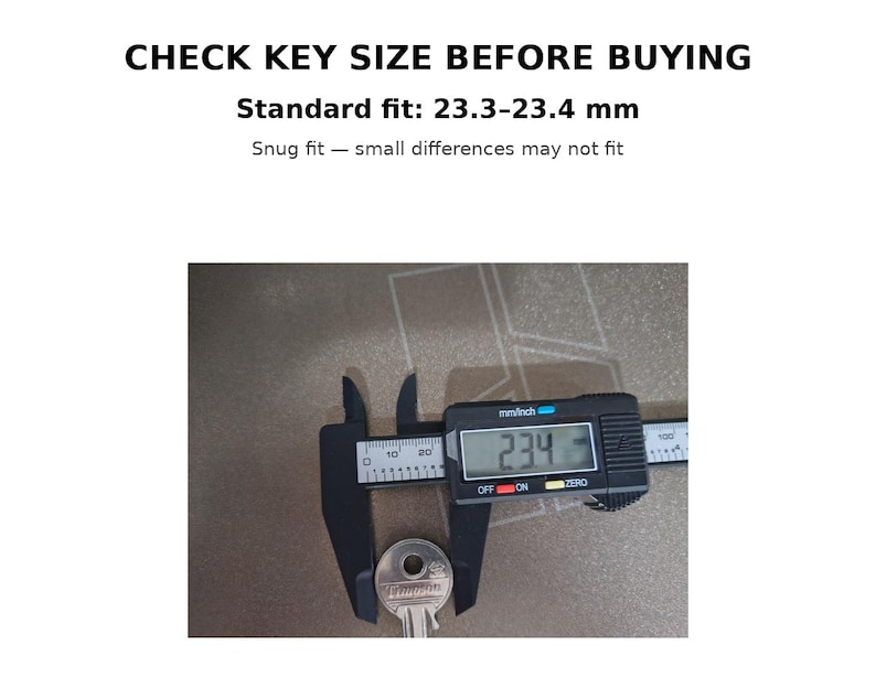 May include: A digital caliper measuring a key, displaying 23.4 mm. The text above reads "CHECK KEY SIZE BEFORE BUYING" and specifies a standard fit of 23.3-23.4 mm. The key is silver and the caliper is black.