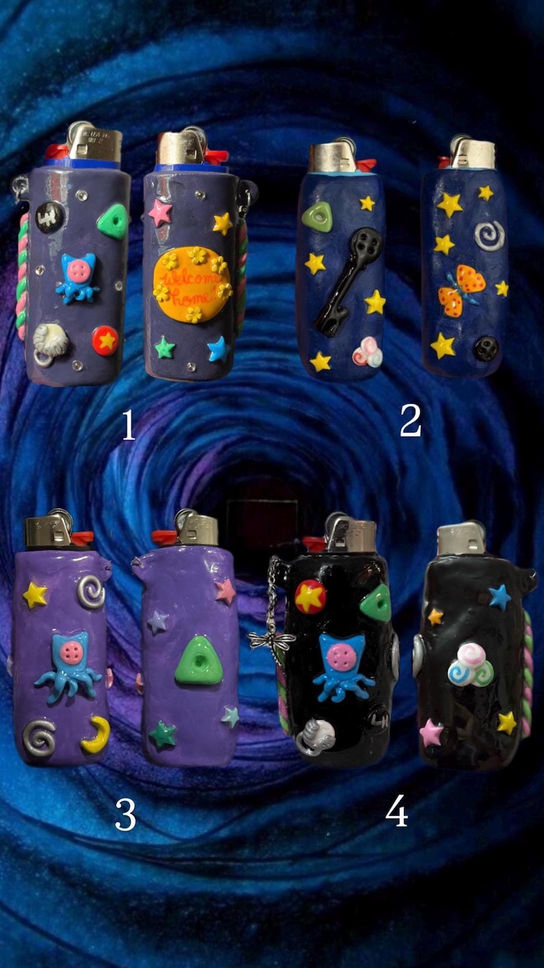 A collection of decorative lighters in various colors, including purple, blue, and black. Each lighter is adorned with unique embellishments such as stars, characters, and other whimsical designs. The lighters are arranged against a dark blue background.