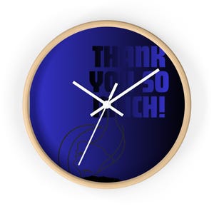 May include: A round wall clock with a wooden frame. The clock face is a gradient of blue, with the words "THANK YOU SO MUCH!" in black and blue. A line drawing of a woman's profile is at the bottom.
