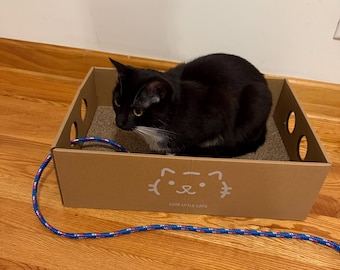 Drapak dla kota Pudełko tekturowe z matą do drapania i sznurkiem do ciągnięcia