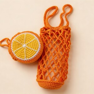 Orange crochet drink carrier, foldable fruit charm transforms into mesh bottle holder bag, reusable crochet cup sling, compact to carry