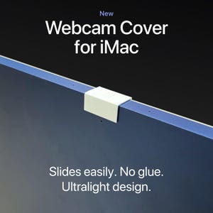 May include: A white webcam cover for iMac, shown attached to the top of the screen. The cover is rectangular with a simple design. Text on the image reads "New Webcam Cover for iMac" and "Slides easily. No glue. Ultralight design."