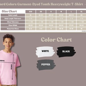 May include: A Comfort Colors Garment-Dyed Youth Heavyweight T-Shirt 9018 size and color chart. The size chart lists body length, chest width, and numerical sizes from XXS to XL in inches. The color chart displays white, black, and pepper swatches.