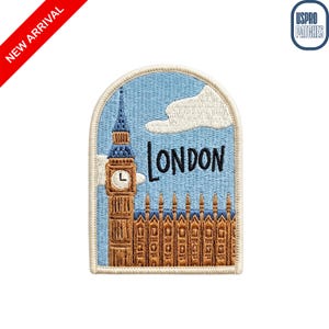 May include: An embroidered patch featuring the Elizabeth Tower and the Palace of Westminster in brown and blue threads against a light blue sky with a white cloud. The word LONDON is stitched in black script above the building structure.