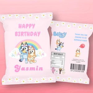 May include: Two pink party favor bags with daisy trim. One bag features a rainbow, cartoon characters, and the text "Happy Birthday Yasmin." The other bag has the text "Bluey" and "Thank you for coming to my birthday party."