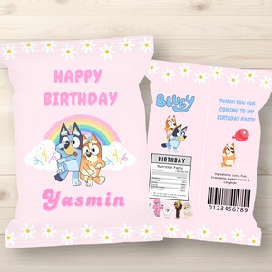 May include: Pink party favor bag with daisy trim, featuring the text "HAPPY BIRTHDAY Yasmin" above a rainbow and cartoon characters. The bag also has the text "BLUEY" and "THANK YOU FOR COMING TO MY BIRTHDAY PARTY".