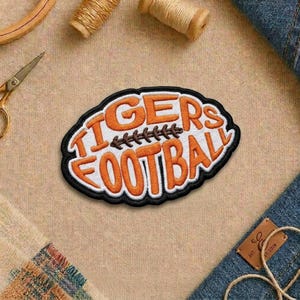 May include: A set of three ceramic mugs with a speckled, matte finish. The mugs are in shades of cream, light gray, and dark gray. Each mug has a simple, minimalist design, perfect for coffee or tea.