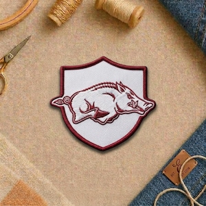 May include: A set of three ceramic mugs with a speckled, matte finish. The mugs are in shades of cream, light gray, and dark gray. Each mug has a simple, minimalist design, perfect for coffee or tea.