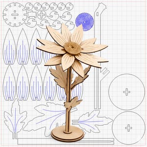 May include: A wooden sunflower model with a detailed design, featuring petals, leaves, and a textured centre. The model is assembled and stands on a round base. Surrounding the model are the laser cut pieces for assembly.