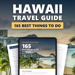 May include: A digital Hawaii travel guide displayed on a tablet screen, featuring the title 165 Best Things to Do in Hawaii, accompanied by printed pages showing lists and descriptions of various sights, experiences, and activities in Hawaii.