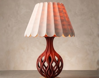 La lámpara escultural Merlot: textura orgánica y luz suave para la decoración del hogar.