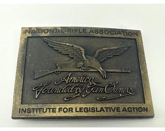 Fibbia per cintura vintage NRA America fondata dai possessori di armi da fuoco Aquila Fucile Ottone USA 1841