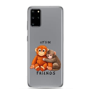 Könnte beinhalten: Handyhülle mit grauem Hintergrund mit zwei Zeichentrickaffen. Ein Affe ist orange und der andere braun. Der Text "LET'S BE FRIENDS" ist in Schwarz geschrieben.