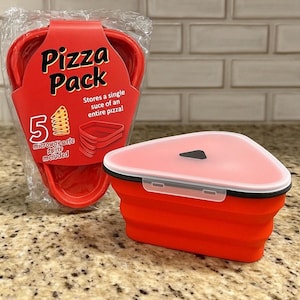 May include: A red, collapsible pizza slice container with a white lid and black trim, next to a package of five red pizza slice containers. The package reads "Pizza Pack" and "Stores a single slice of an entire pizza!"