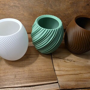 Macetas texturizadas: decoración geométrica moderna para el hogar.