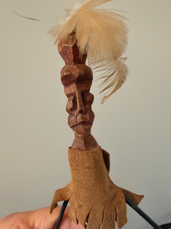 A 12" hand-carved wood Shaman/Tiki kinetic sculpture that actually balances and moves — unmistakably one person's hands made this.