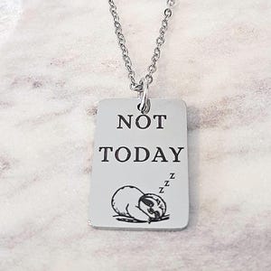 May include: A handmade, wooden serving tray with a natural finish. The tray features a rectangular shape with raised edges and integrated handles. The wood grain is visible, showcasing the tray's rustic charm. Dimensions are approximately 16 inches long, 10 inches wide, and 2 inches high.