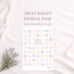 May include: A journal page with the text "ADULT BALLET JOURNAL PAGE" and "Staying Close to Ballet on Rest Days." The page has a grid of colourful squares with ballet prompts. A small bouquet of blue flowers is in the lower left corner. The page is white.