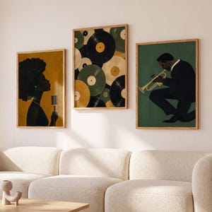 May include: Three framed wall art prints featuring jazz-themed illustrations. The left print shows a person singing into a microphone on a mustard background. The center print displays overlapping vinyl records in black, green, and cream. The right print depicts a musician playing a trumpet on a dark green background.