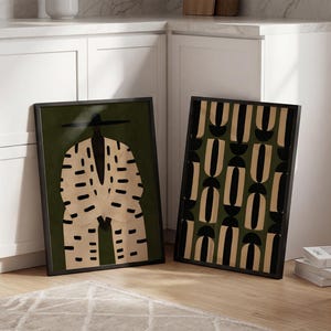 Afrocentric wall decor duo featuring a stylish Black man in a wide-brimmed hat and an abstract geometric print in neutral earthy tones.