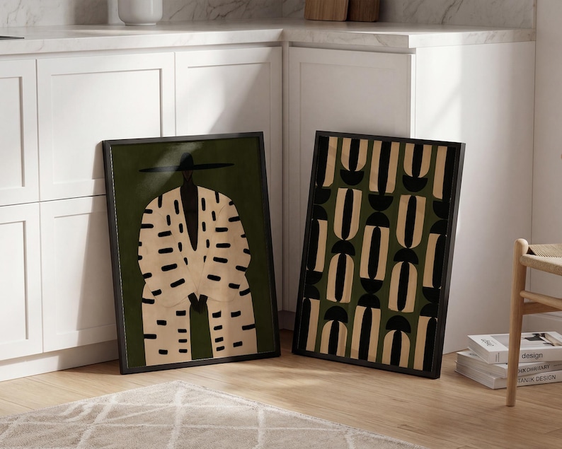 Afrocentric wall decor duo featuring a stylish Black man in a wide-brimmed hat and an abstract geometric print in neutral earthy tones.