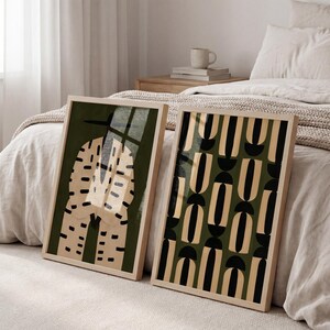 Set of two modern African art prints displayed in natural wood frames, combining a Black male figure with bold geometric pattern artwork.